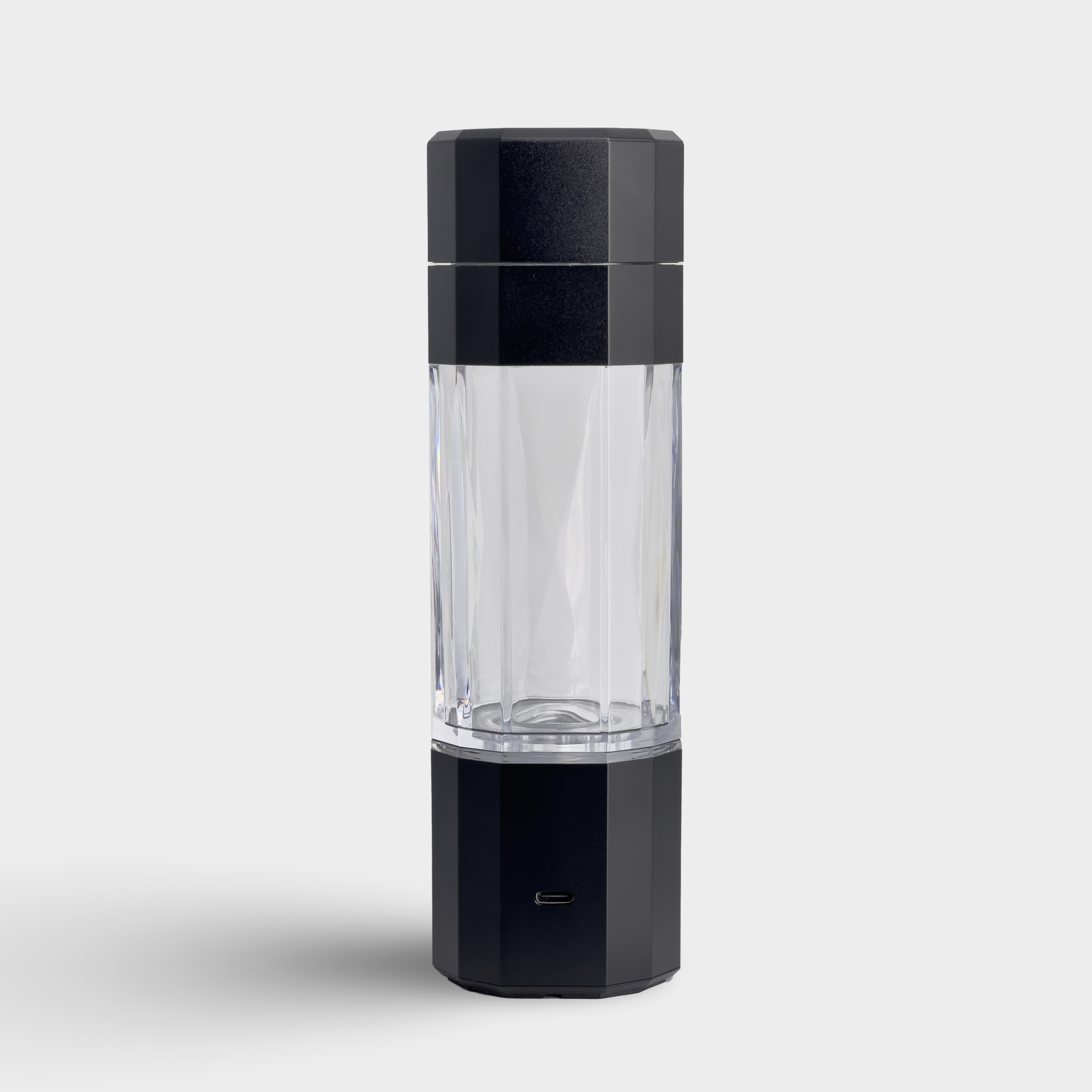 Back view of black KLAR ELITE hydrogen water bottle highlighting the fast charging USB-C port.