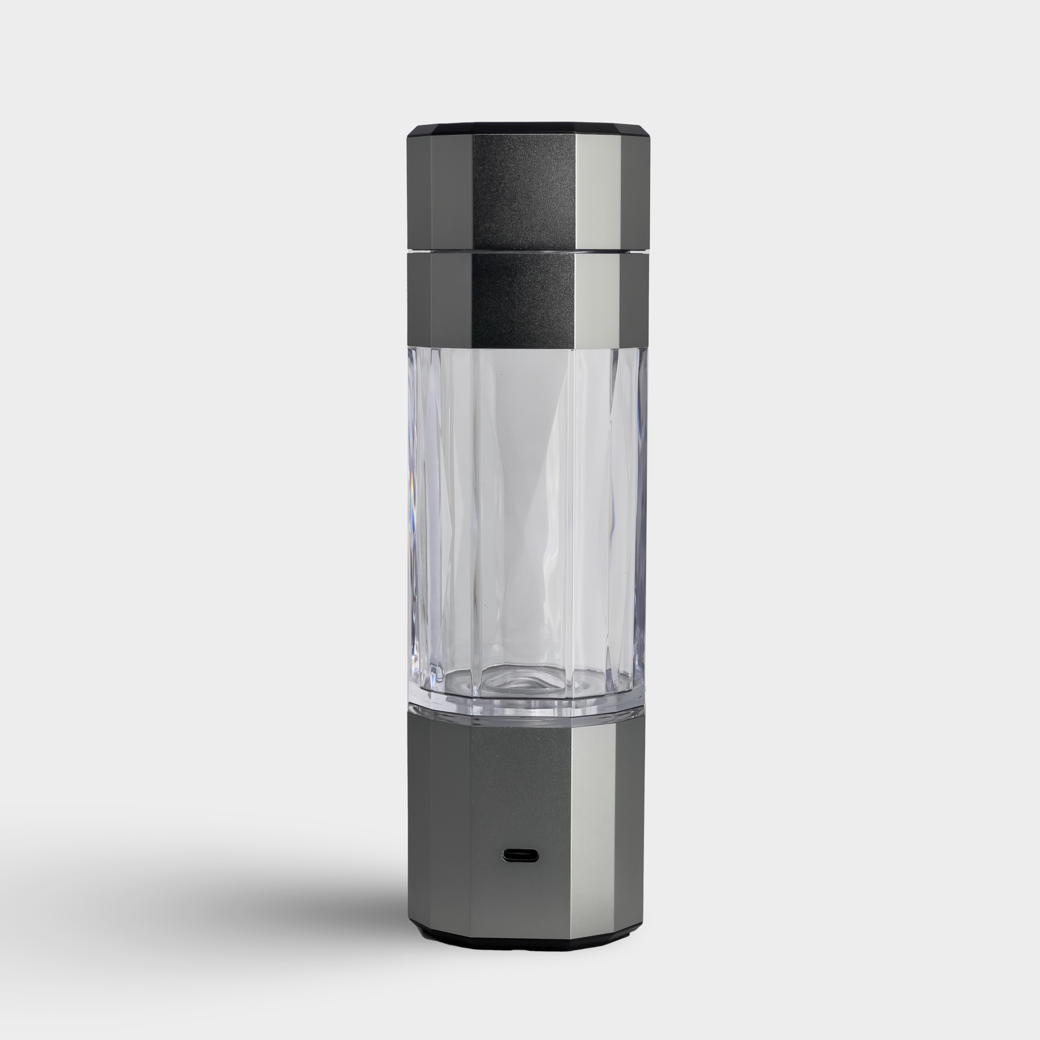 Back view of silver KLAR ELITE hydrogen water bottle highlighting the fast charging USB-C port.